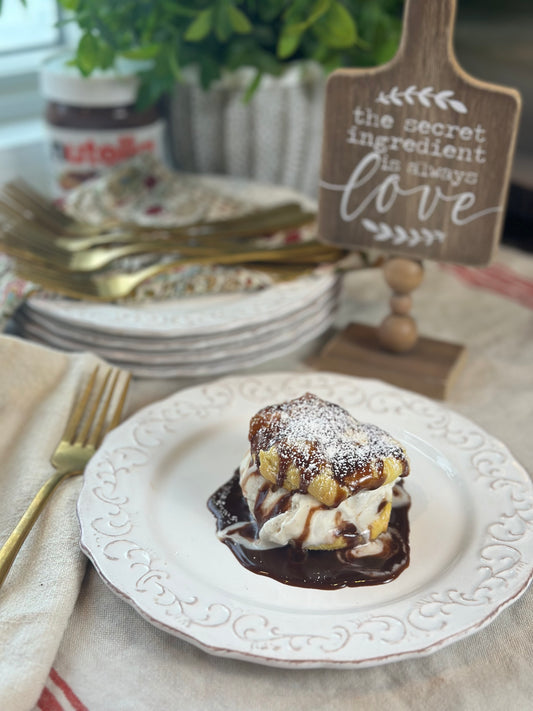 Profiteroles Filled with Vanilla Gelato and Topped with a Nutella Ganache